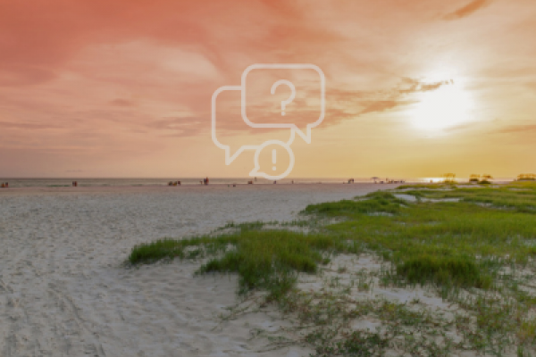 beach at sunset with question icon overlaid
