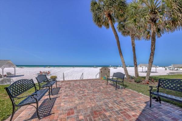 benches by beach in Siesta Key